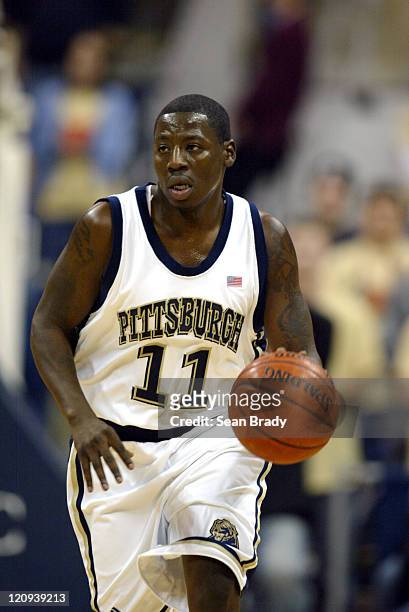 Pittsburgh Panthers' Carl Krauser dribbles up court versus Duquesne at the Petersen Events Center on December 4, 2004 in Pittsburgh, Pennsylvania.