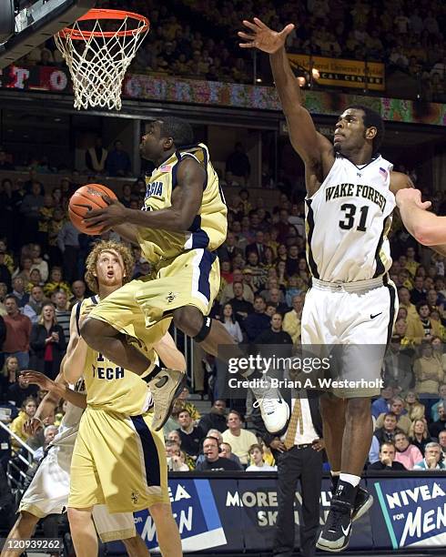 Georgia Tech guard Will Bynum drives to the basket past Wake Forest forward Eric Williams during second half action at the LJVM Coliseum in...