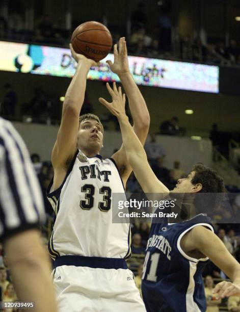 Pittsburgh Panthers' Aaron Gray shoots over Penn States' Milos Bogetic. Pittsburgh won the contest 91-54 at the Petersen Events Center on December...