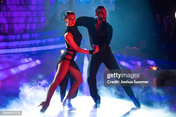 Lili Paul-Roncalli and Massimo Sinato perform on stage during the 1st show of the 13th season of the television competition "Let's Dance" on February...