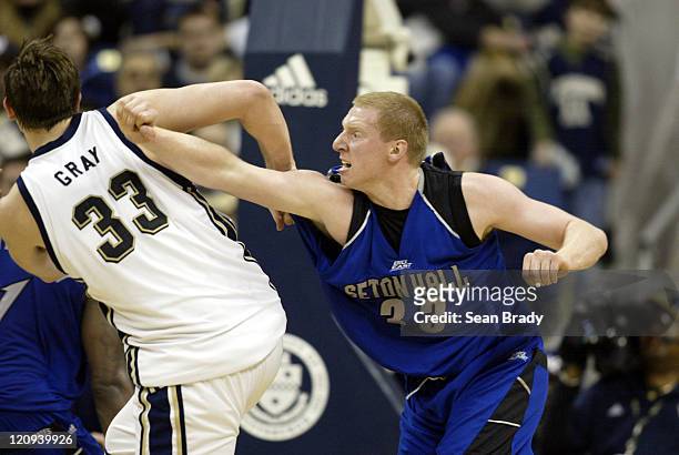 Seton Hall's Grant Billmeier battles with Pittsburgh's Aaron Gray for position during action at the Petersen Events Center on March 3, 2006 in...