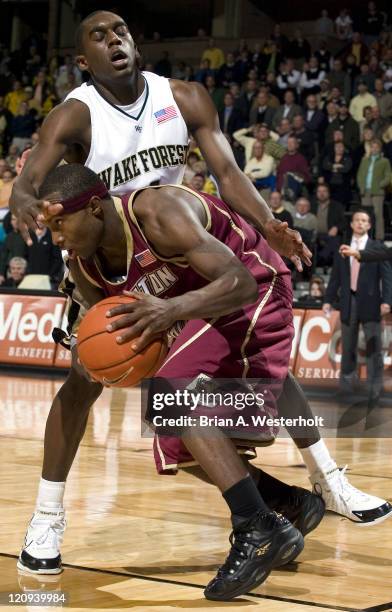 Wake Forest's Harvey Hale fouls Boston College's Tyrese Rice late in the second half of play at the LJVM Coliseum in Winston-Salem, NC, Tuesday,...