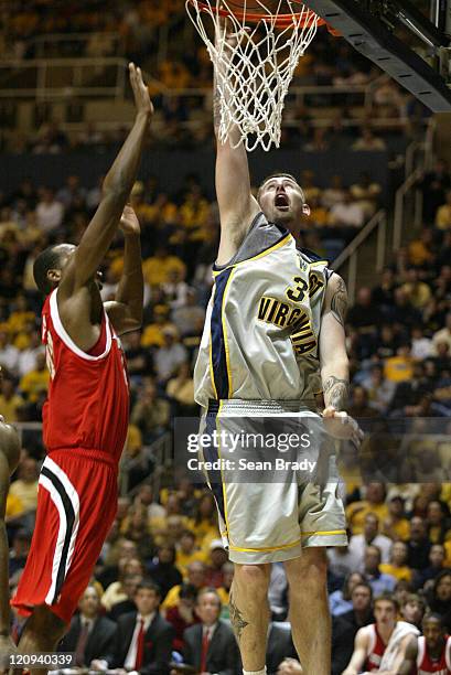 West Virginia's Kevin Pittsnogle lays in 2 points during action against Louisville at the WVU Coliseum in Morgantown, West Virginia on February 25,...