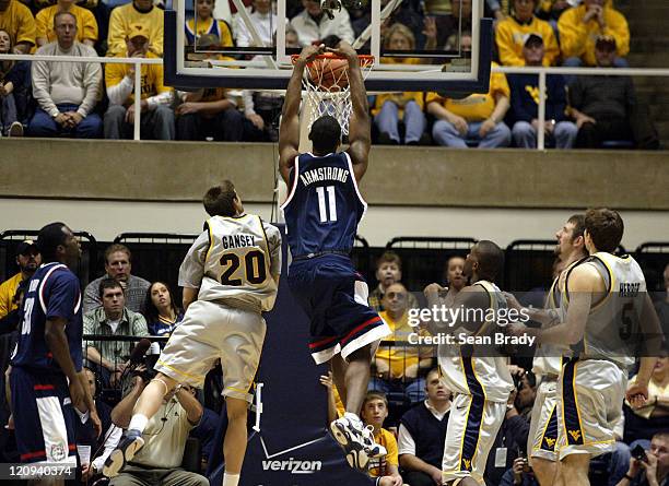 Connecticut's Hilton Armstrong slams home two points versus West Virginia at the WVU Coliseum in Morgantown, West Virginia on Feb. 18, 2005. UConn...