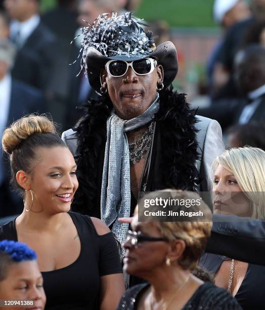 Inductee Dennis Rodman arrives to the Basketball Hall of Fame Enshrinement Ceremony on August 12, 2011 at Symphony Hall in Springfield, Massachusetts.