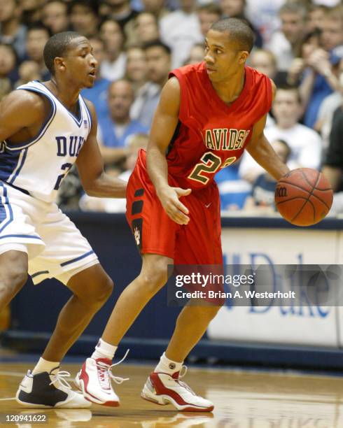 Davidson guard Terrell Ivory looks to back the ball down against Chris Duhon during first half action. Duke defeated Davidson 88-54 at Cameron Indoor...