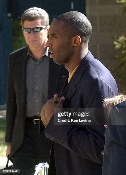 Kobe Bryant arrives at the Eagle County Courthouse with his attorney Pamela Mackey, for his preliminary hearing and bond appearance October 9, 2003...