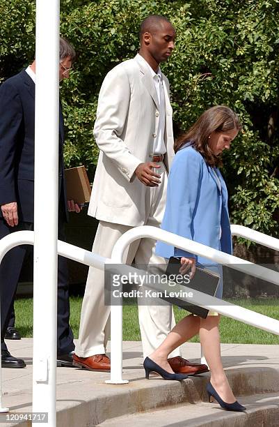 Kobe Bryant leaves the Eagle County Courthouse with his attorney Hal Haddon and lead attorney Pamela Mackey following his advisement hearing. Bryant...