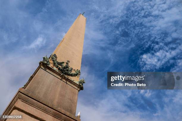 a view from below of the egyptian obelisk located in st. peter's square - obelisk stock pictures, royalty-free photos & images