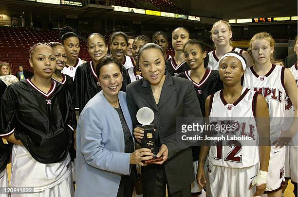 Commissioner Linda Bruno and the Temple Womens Basketball Team present the USA Basketball "Women Athlete of the Year" award to Temple Head Coach Dawn...