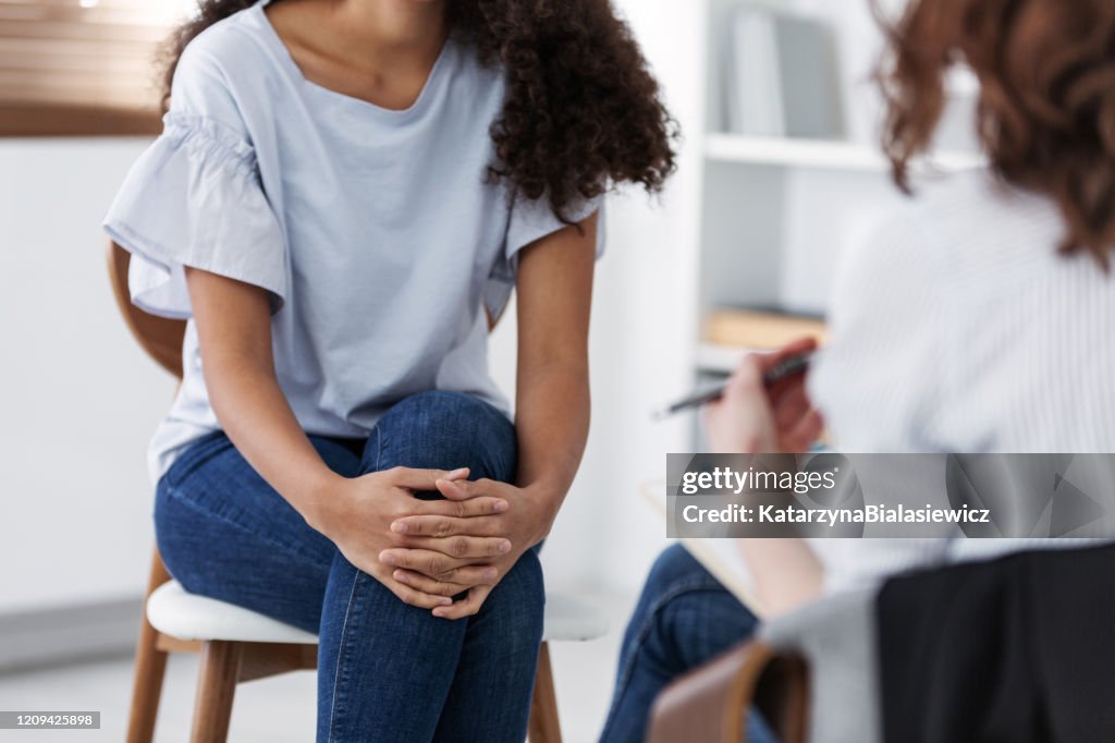 Anonymous photo of two women during group psychotherapy for people with depression