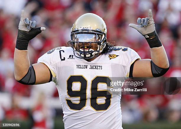 Georgia Tech DT Joe Anoai celebrates a forced fumble during the game between the Georgia Bulldogs and the Georgia Tech Yellow Jackets at Sanford...