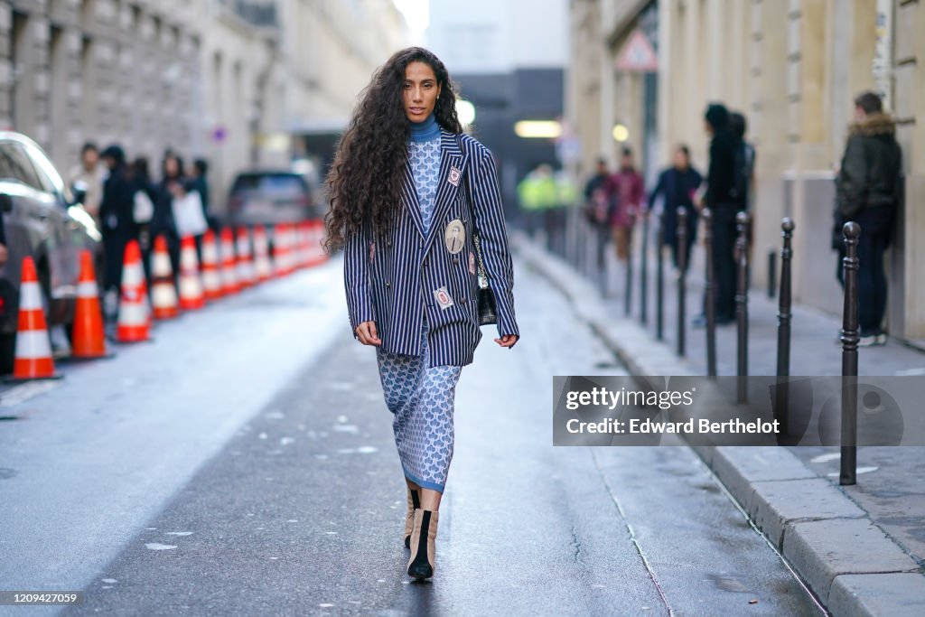 Street Style - Paris Fashion Week - Womenswear Fall/Winter 2020/2021 : Day Two