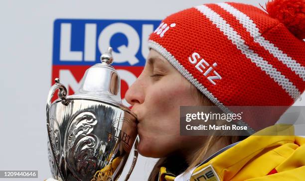 Tina Hermann of Germany celebrates winning the gold medal after the final heat for the Women's Skeleton on day nine of the BMW IBSF World...