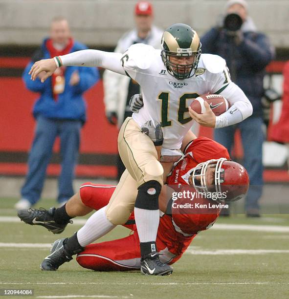 Utahs Greg Newman tackles CSU quarterback Caleb Hanie at Rice-Eccles Stadium in Salt Lake City, Saturday Nov. 11, 2006. Utah defeated CSU 35-22.
