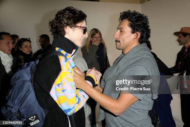 Timothee Chalamet and Haider Ackermann are seen backstage at the Haider Ackermann Womenswear Fall/Winter 2020/2021 show as part of Paris Fashion Week...