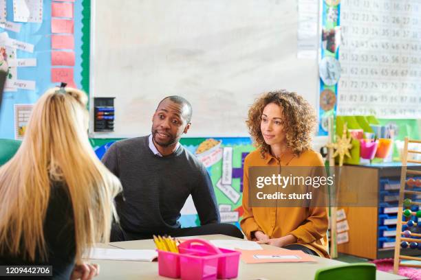 parent teacher meeting - guardian stock pictures, royalty-free photos & images
