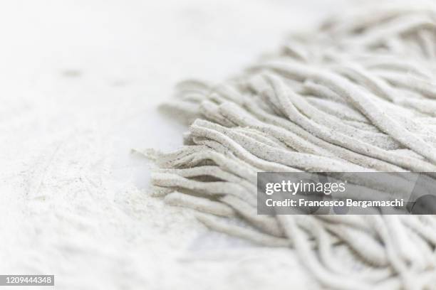 traditional buckweat italian pasta called pizzoccheri. - buckwheat ストックフォトと画像