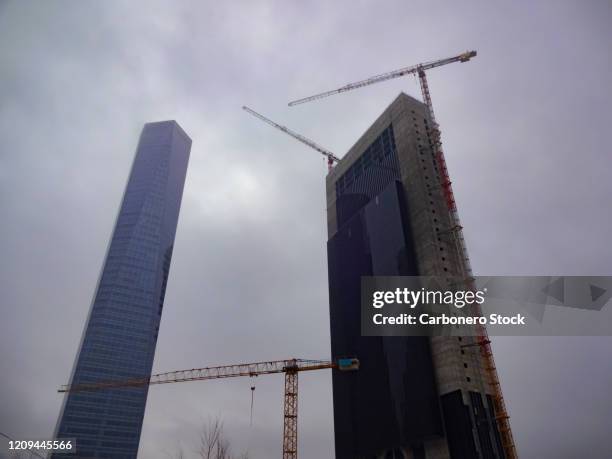 construction project using cranes_07 - three storey stock pictures, royalty-free photos & images