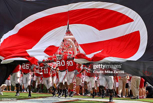 Georgia WR Mario Raley leads the team out of the tunnel before the game against Western Kentucky at Sanford Stadium in Athens, GA on September 2,...