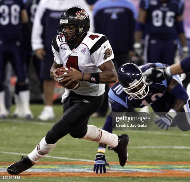 Ottawa QB Kerry Joseph scrambles for yardage in CFL action at Rogers Centre in Toronto Ontario Canada on September 28, 2005.