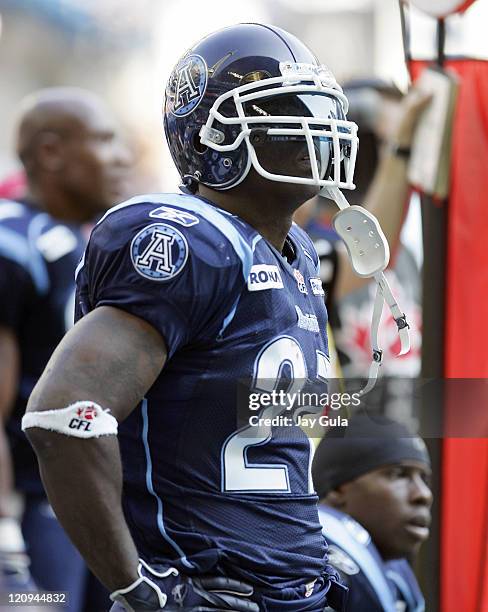 Ricky Williams of the Toronto Argonauts on the sidelines and in action vs the Winnipeg Blue Bombers in a Canadian Football League game at Rogers...