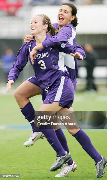 Portland players Megan Rapinoe and Christine Sinclair celebrate Rapinoe's second half goal during the 2005 NCAA Women's College Cup championship game...