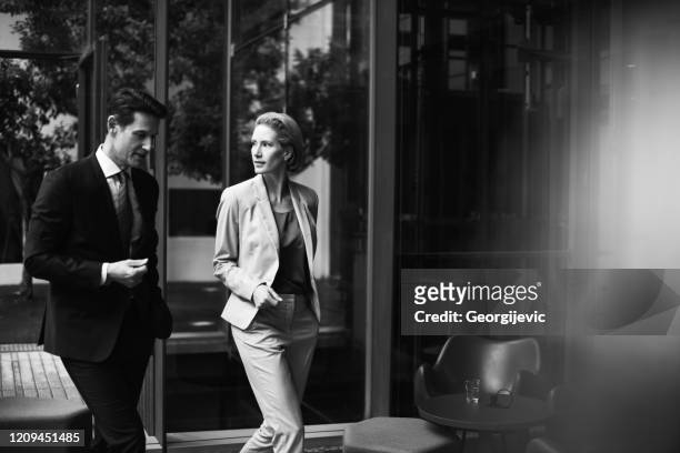 walking through the office. - black and white stock pictures, royalty-free photos & images