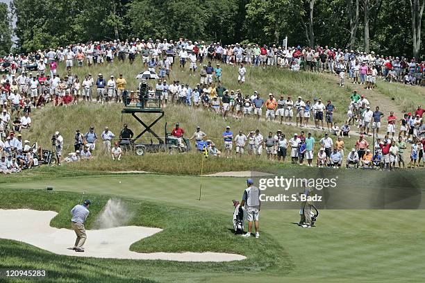 Allen Doyle hits out of the bunker at the 7th in during the third round of the U. S. Senior Open, July 30 held at the NCR Country Club, Kettering,...