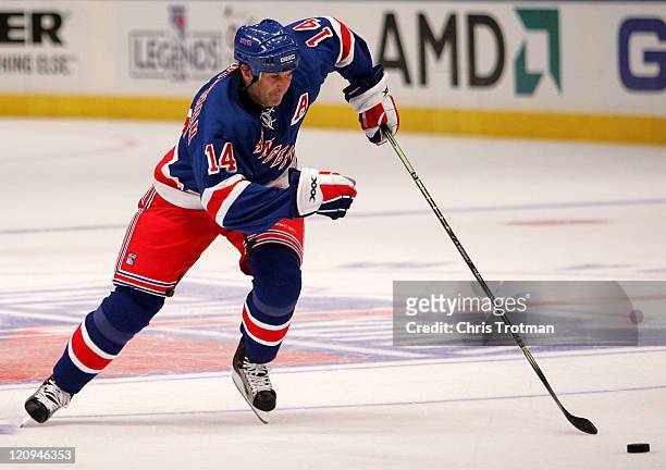New York Ranger Brendan Shanahan carries the puck up ice versus the Washington Capitals at Madison Square Garden, October 5, 2006.