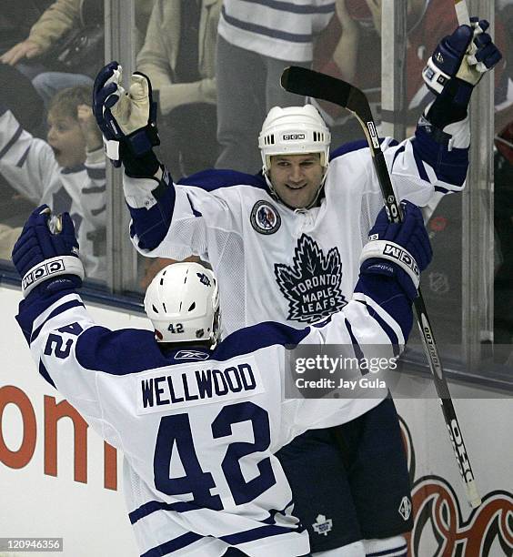 Toronto Maple Leafs Jeff O'Neil is congratulated by teammate Kyle Wellwood after scoring a goal in action vs the Montreal Canadiens at the Air Canada...