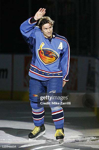 Atlanta Thrashers forward Vyacheslav Kozlov acknowledges the crowd after being named the Star of the game between the Atlanta Thrashers and the...