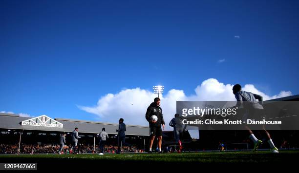 Fulham FC warm up ahead of during the Sky Bet Championship match between Fulham and Preston North End at Craven Cottage on February 29, 2020 in...