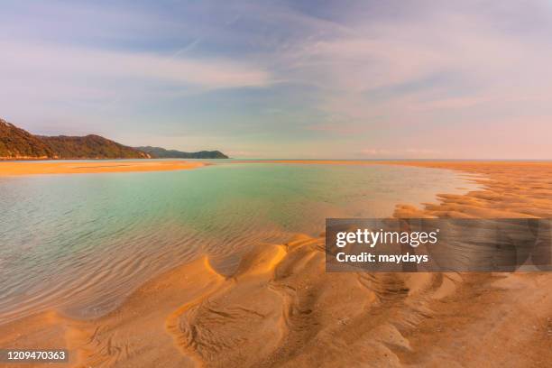 abel tasman national park, new zealand - kaiteriteri stockfoto's en -beelden