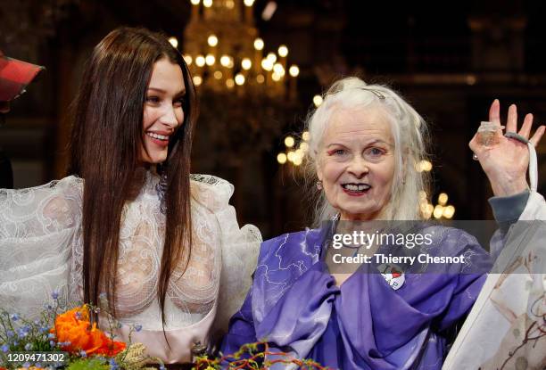 Model Bella Hadid model and British designer Vivienne Westwood pose at the end the Vivienne Westwood show as part of the Paris Fashion Week...