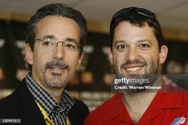 Mark S. Tafett, Senior Vice President of Sports Operations & Pay-Per-view of HBO Sports and Tony Stewart, promote "NEXTEL PRELUDE TO THE DREAM" to be...