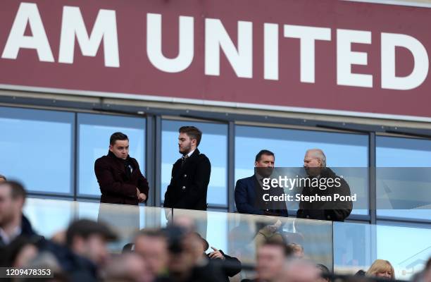 West Ham United's Jack Sullivan and West Ham United's Chairman David Gold look on during the Premier League match between West Ham United and...