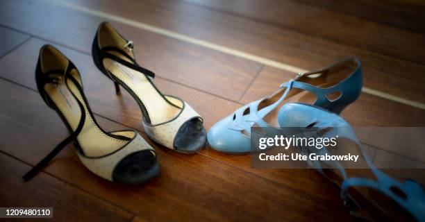 Two pairs of dancing shoes on a wooden floor on April 07, 2020 in Bonn, Germany.