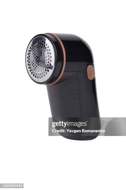 fabric shaver isolated on white background - bobble hat stock pictures, royalty-free photos & images
