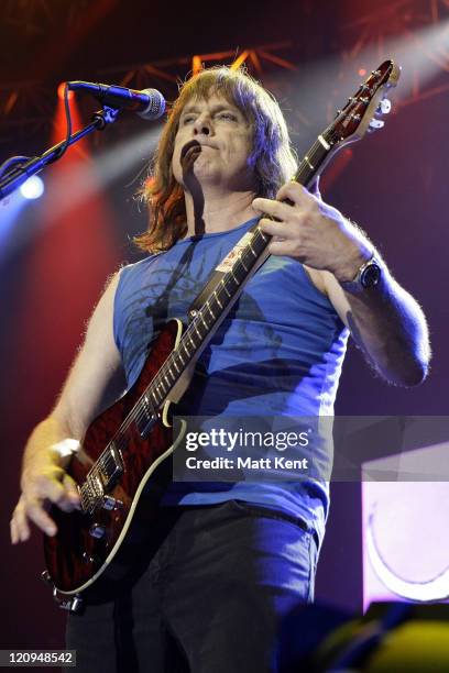 Christopher Guest performs as Nigel Tufnel of Spinal Tap at their 'One Night World Tour' at Wembley Arena on June 30, 2009 in London, England.