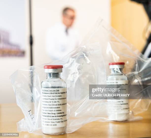 Vials of the drug Remdesivir lie during a press conference about the start of a study with the Ebola drug Remdesivir in particularly severely ill...