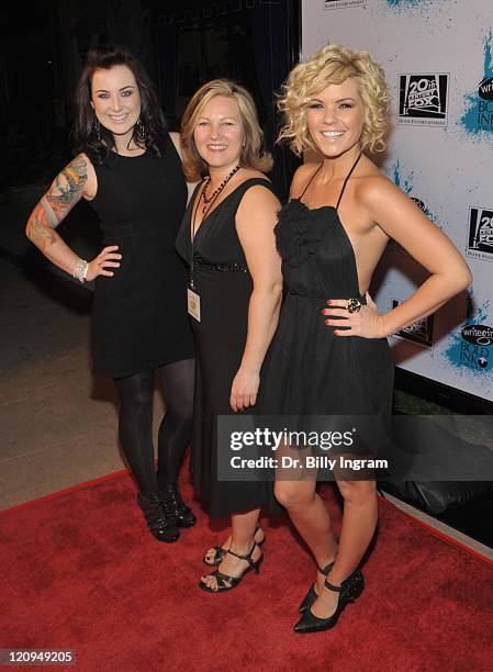 Former American Idol contestant Carlie Simpson and executive director Keren Taylor, and former American Idol contestant Kimberly Caldwell arrive at...