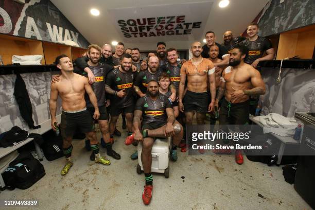 The Harlequins players celebrate in their dressing room after the Gallagher Premiership Rugby match between Harlequins and Exeter Chiefs at...