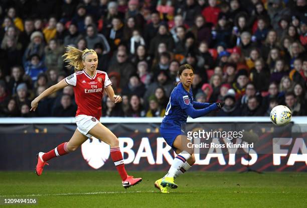 Sam Kerr of Chelsea shoots as she is put under pressure by Leah Williamson of Arsenal during the FA Women's Continental League Cup Final Chelsea FC...