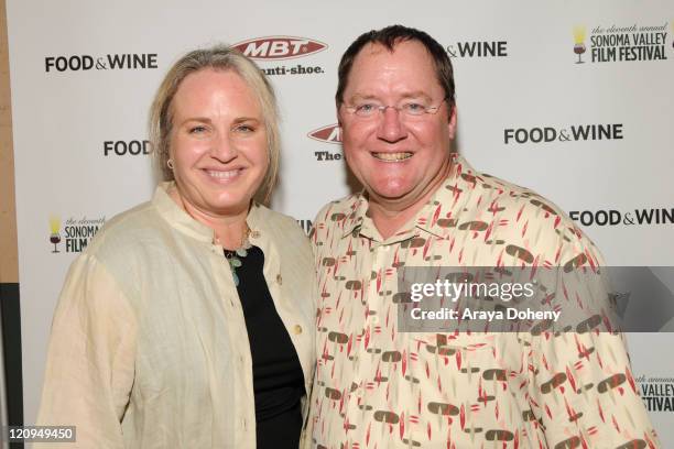 Producer Darla K. Anderson and Chief Creative Officer of Pixar Animation Studios John Lasseter attend the "Festival Tribute to Michael Keaton" at the...