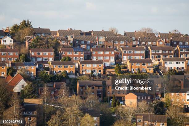 Residential properties stand on a hillside in High Wycombe, U.K., on Monday, April 6, 2020. Among the decisions that my need to be made in U.K. Prime...