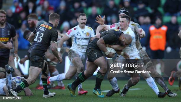 Paul Lasike of Harlequins takes on the Exeter Chieks defence during the Gallagher Premiership Rugby match between Harlequins and Exeter Chiefs at...