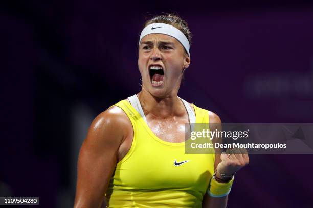 Aryna Sabalenka of Belarus celebrates winning a point against Petra Kvitova of Czech Republic in the Singles Final match on Day 7 of the WTA Qatar...