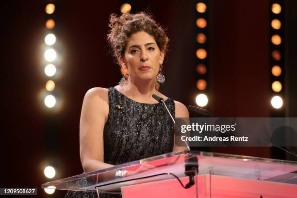 Member of the International Jury Annemarie Jacir is seen on stage at the closing ceremony of the 70th Berlinale International Film Festival Berlin at...