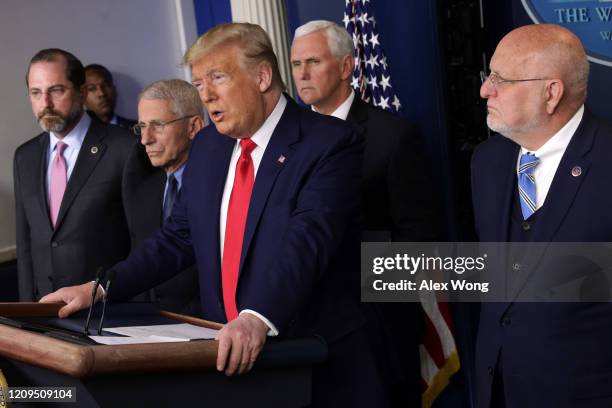 President Donald Trump speaks as Health and Human Services Secretary Alex Azar, National Institute for Allergy and Infectious Diseases Director...